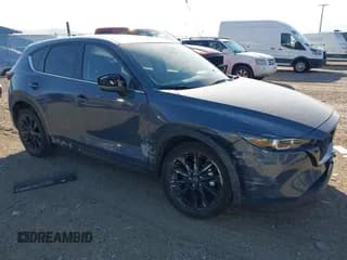 ✅ 2025 Mazda CX-5 S Carbon Edition • VIN: JM3KFBCM8S0587267 • Лот: 43018737. Опубликован ранее на IAAI с пробегом 19 192 миль. Бесплатный доступ к архиву аукционных продаж из США и подробный отчёт об истории автомобиля на DreamBid. Изображение 1.