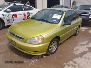 ✅ 2001 Kia Rio • VIN: KNADC123616048085 • Lot: 42025600. Listed on IAAI with 123,493 mi. Free auction sales archive from the USA and detailed vehicle history report at DreamBid. Image 2.
