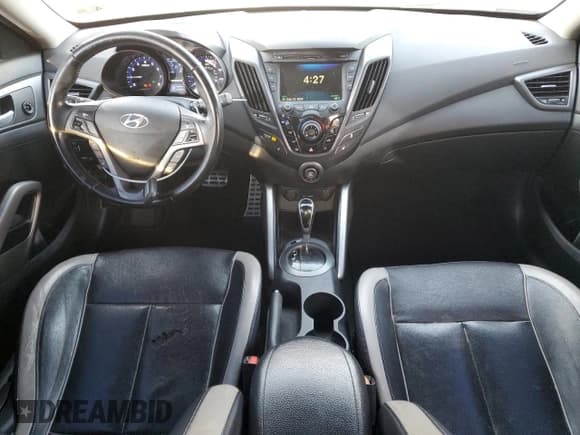 ✅ 2014 Hyundai Veloster Turbo • VIN: KMHTC6AE2EU193216 • Lot: 85075714. Listed on Copart with 96,611 mi. Free auction sales archive from the USA and detailed vehicle history report at DreamBid. Image 8.