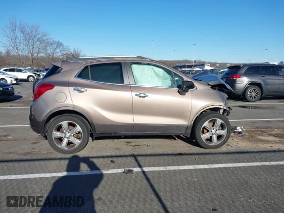 ✅ 2014 Buick Encore • VIN: KL4CJESB5EB600301 • Lot: 41066147. Wystawiony na IAAI z przebiegiem 60 190 mil. Bezpłatny archiwum sprzedaży aukcyjnych z USA i szczegółowy raport historii pojazdu na DreamBid. Zdjęcie 13.