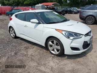 ✅ 2015 Hyundai Veloster • VIN: KMHTC6ADXFU232692 • Lot: 42407054. Wystawiony na IAAI z przebiegiem 80 745 mil. Bezpłatny archiwum sprzedaży aukcyjnych z USA i szczegółowy raport historii pojazdu na DreamBid. Zdjęcie 1.