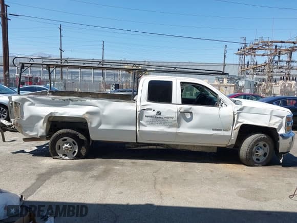 ✅ 2015 Chevrolet Silverado 2500HD Work Truck • VIN: 1GC2CUEGXFZ105548 • Lot: 42816741. Listed on IAAI with 249,611 mi. Free auction sales archive from the USA and detailed vehicle history report at DreamBid. Image 13.