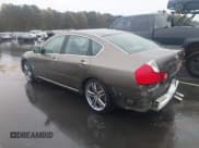 ✅ 2006 Infiniti M • VIN: JNKAY01EX6M116197 • Lot: 43522833. Listed on IAAI with 207,095 mi. Free auction sales archive from the USA and detailed vehicle history report at DreamBid. Image 3.