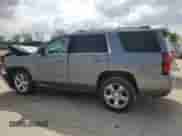 2020 Chevrolet Tahoe Premier with VIN 1GNSKCKC7LR125399, listed as a Copart auction lot 54702635 with 134,684 mi miles and Salvage title. Bid and sale history available at DreamBid. Image 2.