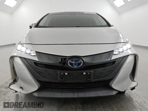 ✅ 2021 Toyota Prius LE • VIN: JTDKAMFPXM3190461 • Лот: 85264545. Опубликован ранее на Copart с пробегом 149 598 миль. Бесплатный доступ к архиву аукционных продаж из США и подробный отчёт об истории автомобиля на DreamBid. Изображение 5.