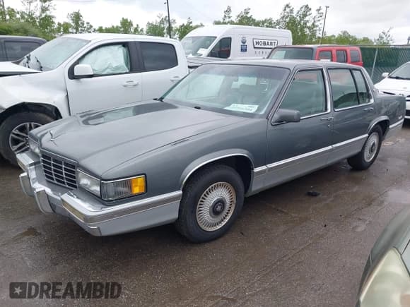 ✅ 1993 Cadillac DeVille • VIN: 1G6CD53B3P4222579 • Lot: 42316504. Listed on IAAI with 100,577 mi. Free auction sales archive from the USA and detailed vehicle history report at DreamBid. Image 2.