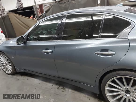 ✅ 2015 Infiniti Q50 Premium • VIN: JN1BV7AP6FM337369 • Lot: 41788419. Listed on IAAI with 106,977 mi. Free auction sales archive from the USA and detailed vehicle history report at DreamBid. Image 14.