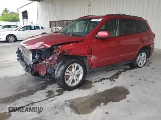 ✅ 2012 Hyundai Santa Fe SE • VIN: 5XYZH4AG7CG132951 • Lot: 67467275. Listed on Copart with Not provided. Free auction sales archive from the USA and detailed vehicle history report at DreamBid. Image 1.