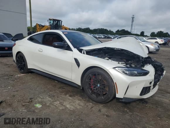 ✅ 2022 BMW M4 • VIN: WBS53AZ05NCH86997 • Lot: 65124395. Listed on Copart with 69,657 mi. Free auction sales archive from the USA and detailed vehicle history report at DreamBid. Image 4.