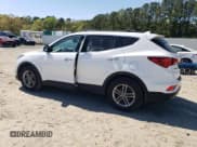 ✅ 2018 Hyundai Santa Fe 2.4L • VIN: 5NMZU3LB0JH060954 • Лот: 51750544. Опубликован ранее на Copart с пробегом 123 970 миль. Бесплатный доступ к архиву аукционных продаж из США и подробный отчёт об истории автомобиля на DreamBid. Изображение 2.