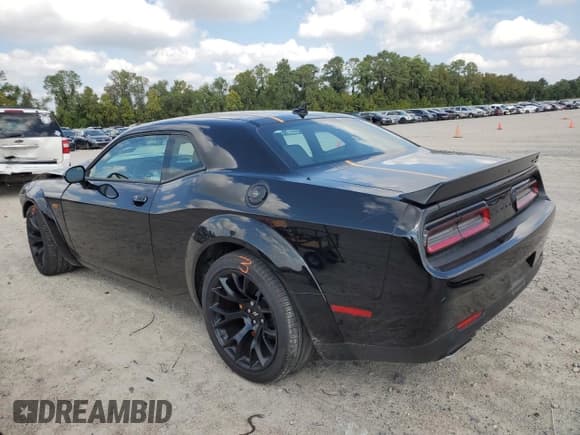 ✅ 2022 Dodge Challenger R/T Scat Pack Widebody • VIN: 2C3CDZFJ7NH122528 • Lot: 67906613. Listed on Copart with 12,809 mi. Free auction sales archive from the USA and detailed vehicle history report at DreamBid. Image 2.