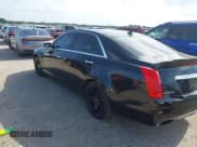 ✅ 2014 Cadillac CTS Vsport RWD • VIN: 1G6AU5S80E0157000 • Lot: 42421328. Listed on IAAI with 130,953 mi. Free auction sales archive from the USA and detailed vehicle history report at DreamBid. Image 3.