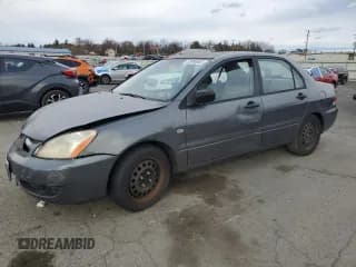 ✅ 2006 Mitsubishi Lancer ES • VIN: JA3AJ26E06U045200 • Lot: 92698565. Listed on Copart with 114,769 mi. Free auction sales archive from the USA and detailed vehicle history report at DreamBid. Image 1.