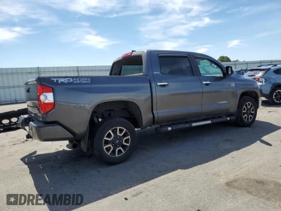 ✅ 2021 Toyota Tundra Limited • VIN: 5TFHY5F15MX973106 • Lot: 69115445. Listed on Copart with 199,540 mi. Free auction sales archive from the USA and detailed vehicle history report at DreamBid. Image 3.