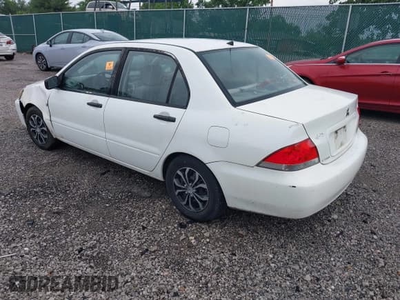 ✅ 2004 Mitsubishi Lancer ES • VIN: JA3AJ26E04U044304 • Lot: 42408636. Listed on IAAI with 232,865 mi. Free auction sales archive from the USA and detailed vehicle history report at DreamBid. Image 3.