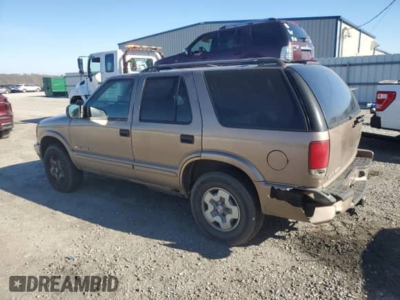 ✅ 2004 Chevrolet Blazer LS • VIN: 1GNDT13X84K158661 • Lot: 85697264. Wystawiony na Copart z przebiegiem 163 809 mil. Bezpłatny archiwum sprzedaży aukcyjnych z USA i szczegółowy raport historii pojazdu na DreamBid. Zdjęcie 2.