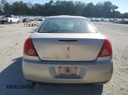 ✅ 2009 Pontiac G6 1SB • VIN: 1G2ZJ57B494245077 • Лот: 93170145. Опубликован ранее на Copart с пробегом 141 415 миль. Бесплатный доступ к архиву аукционных продаж из США и подробный отчёт об истории автомобиля на DreamBid. Изображение 6.