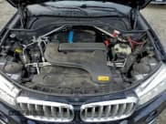 ✅ 2018 BMW X5 xDrive40e • VIN: 5UXKT0C56J0W00528 • Lot: 94754885. Wystawiony na Copart z przebiegiem 128 145 mil. Bezpłatny archiwum sprzedaży aukcyjnych z USA i szczegółowy raport historii pojazdu na DreamBid. Zdjęcie 12.