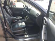 ✅ 2014 Mazda CX-5 Grand Touring • VIN: JM3KE4DY5E0313755 • Lot: 43202361. Wystawiony na IAAI z przebiegiem 214 033 mil. Bezpłatny archiwum sprzedaży aukcyjnych z USA i szczegółowy raport historii pojazdu na DreamBid. Zdjęcie 5.