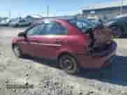 2006 Hyundai Accent GL with VIN KMHCN45C26U052459, listed as a Copart auction lot 84417075 with 247,312 mi miles and Salvage title. Bid and sale history available at DreamBid. Image 2.