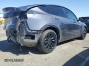 ✅ 2022 Tesla Model Y Long Range • VIN: 7SAYGDEE3NF507044 • Lot: 57560425. Wystawiony na Copart z przebiegiem 46 853 mil. Bezpłatny archiwum sprzedaży aukcyjnych z USA i szczegółowy raport historii pojazdu na DreamBid. Zdjęcie 3.