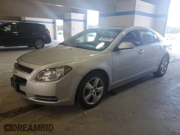 2012 Chevrolet Malibu 2LT z VIN 1G1ZD5E07CF330472, wystawiony jako Copart lot #69040254 z przebiegiem 136 393 mil mil oraz Szkoda całkowita • Salvage title. Historia ofert i sprzedaży dostępna na DreamBid. Obrazek 1.
