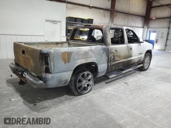 ✅ 2006 GMC Sierra Denali • VIN: 2GTEK63N061278100 • Lot: 80086005. Listed on Copart with Not provided. Free auction sales archive from the USA and detailed vehicle history report at DreamBid. Image 3.