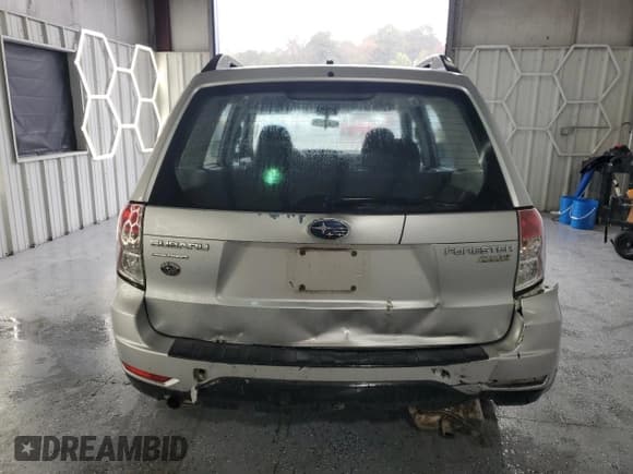 ✅ 2010 Subaru Forester X • VIN: JF2SH6BC1AH781854 • Lot: 90033625. Listed on Copart with 93,817 mi. Free auction sales archive from the USA and detailed vehicle history report at DreamBid. Image 6.