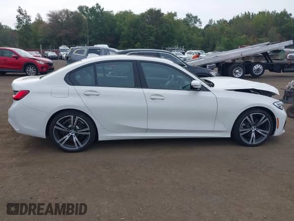 2020 BMW 3 Series 330i xDrive z VIN 3MW5R7J04L8B19857, wystawiony jako IAAI lot #43293574 z przebiegiem 19 853 mil mil oraz . Historia ofert i sprzedaży dostępna na DreamBid. Obrazek 13.