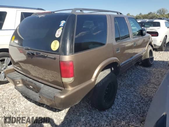 2004 Chevrolet Blazer LS с VIN 1GNDT13X24K162124, выставлен на аукционе Copart как лот 69428095 с пробегом Не указан миль и Списание • Salvage title. История ставок и продаж доступна на DreamBid. Изображение 3.