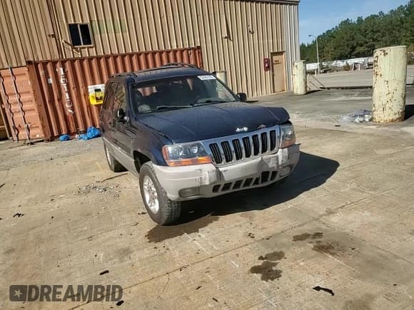 ✅ 2002 Jeep Grand Cherokee Laredo • VIN: 1J4GX48S02C288301 • Lot: 82662105. Listed on Copart with Not provided. Free auction sales archive from the USA and detailed vehicle history report at DreamBid. Image 13.