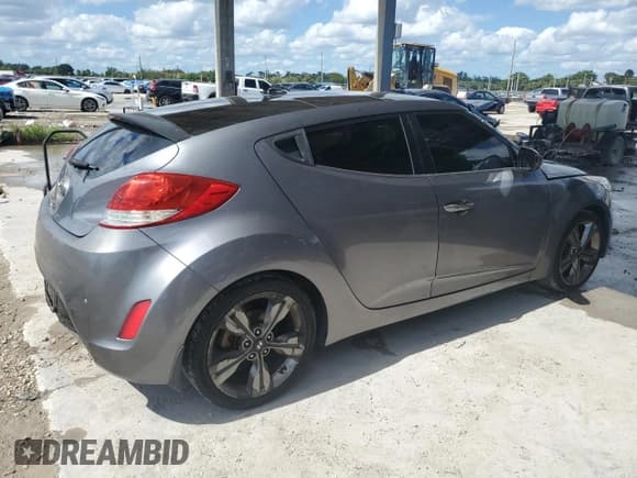 ✅ 2016 Hyundai Veloster • VIN: KMHTC6AD5GU255170 • Lot: 76111294. Wystawiony na Copart z przebiegiem 77 026 mil. Bezpłatny archiwum sprzedaży aukcyjnych z USA i szczegółowy raport historii pojazdu na DreamBid. Zdjęcie 3.