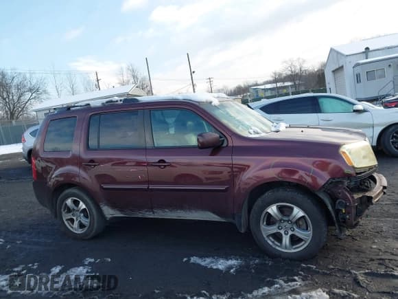 ✅ 2014 Honda Pilot EX-L • VIN: 5FNYF4H54EB008300 • Lot: 43848135. Listed on IAAI with 221,079 mi. Free auction sales archive from the USA and detailed vehicle history report at DreamBid. Image 13.