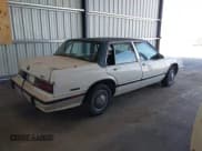 ✅ 1988 Buick LeSabre • VIN: 1G4HR54C4JH487972 • Lot: 42194796. Wystawiony na IAAI z przebiegiem 115 011 mil. Bezpłatny archiwum sprzedaży aukcyjnych z USA i szczegółowy raport historii pojazdu na DreamBid. Zdjęcie 4.