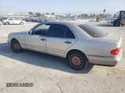 ✅ 1999 Mercedes-Benz E 320 • VIN: WDBJF65H9XA874886 • Lot: 82583865. Listed on Copart with 158,804 mi. Free auction sales archive from the USA and detailed vehicle history report at DreamBid. Image 2.