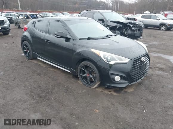 ✅ 2014 Hyundai Veloster Turbo • VIN: KMHTC6AE9EU197022 • Lot: 43800902. Listed on IAAI with 155,258 mi. Free auction sales archive from the USA and detailed vehicle history report at DreamBid. Image 1.