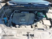 ✅ 2014 Mazda CX-5 Grand Touring • VIN: JM3KE2DY3E0339601 • Lot: 42652114. Wystawiony na IAAI z przebiegiem 153 063 mil. Bezpłatny archiwum sprzedaży aukcyjnych z USA i szczegółowy raport historii pojazdu na DreamBid. Zdjęcie 10.