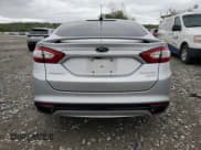 ✅ 2015 Ford Fusion Titanium • VIN: 3FA6P0K91FR279510 • Лот: 52875435. Опубликован ранее на Copart с пробегом 93 519 миль. Бесплатный доступ к архиву аукционных продаж из США и подробный отчёт об истории автомобиля на DreamBid. Изображение 6.