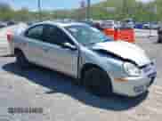 2004 Dodge Neon SXT z VIN 1B3ES56C44D580657, wystawiony jako IAAI lot #42137299 z przebiegiem 138 918 mil mil oraz . Historia ofert i sprzedaży dostępna na DreamBid. Obrazek 1.