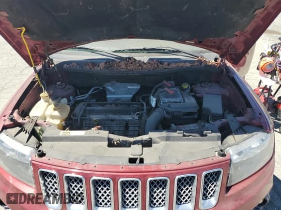 ✅ 2017 Jeep Compass Latitude • VIN: 1C4NJCEA9HD117490 • Lot: 69504935. Listed on Copart with 170,574 mi. Free auction sales archive from the USA and detailed vehicle history report at DreamBid. Image 12.