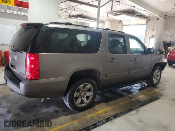 ✅ 2012 GMC Yukon XL SLT • VIN: 1GKS2KE74CR256764 • Lot: 63197125. Listed on Copart with 209,616 mi. Free auction sales archive from the USA and detailed vehicle history report at DreamBid. Image 3.