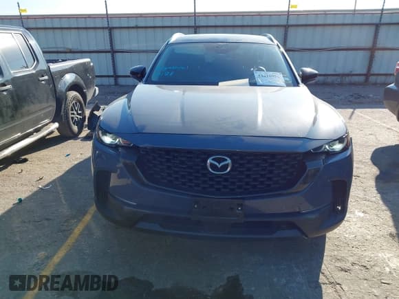 ✅ 2024 Mazda CX-50 S Preferred • VIN: 7MMVABBM2RN217211 • Lot: 43410951. Listed on IAAI with 14,009 mi. Free auction sales archive from the USA and detailed vehicle history report at DreamBid. Image 12.