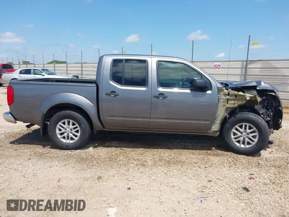 ✅ 2021 Nissan Frontier SV • VIN: 1N6ED0EA0MN710260 • Lot: 42292937. Listed on IAAI with 63,573 mi. Free auction sales archive from the USA and detailed vehicle history report at DreamBid. Image 13.