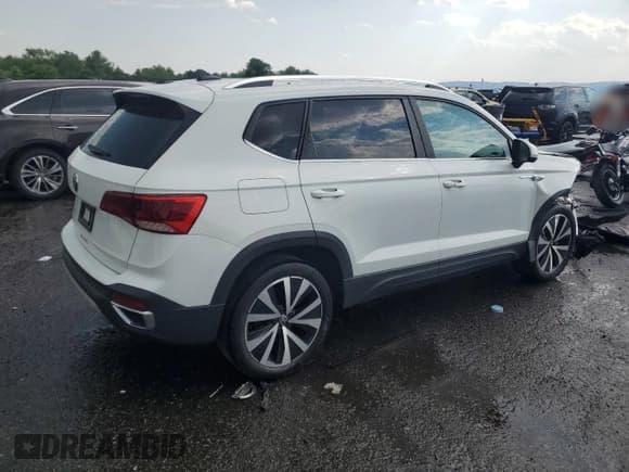 ✅ 2022 Volkswagen Taos SE • VIN: 3VVLX7B2XNM012789 • Лот: 63559615. Опубликован ранее на Copart с пробегом 57 682 миль. Бесплатный доступ к архиву аукционных продаж из США и подробный отчёт об истории автомобиля на DreamBid. Изображение 3.