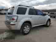 2011 Mercury Mariner z VIN 4M2CN8B73BKJ06886, wystawiony jako Copart lot #50308485 z przebiegiem 118 584 mil mil oraz Szkoda całkowita • Salvage title. Historia ofert i sprzedaży dostępna na DreamBid. Obrazek 3.