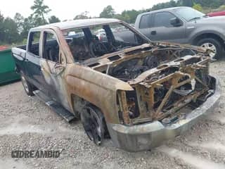 2018 Chevrolet Silverado 1500 LT z VIN 3GCUKREC5JG637658, wystawiony jako IAAI lot #43321949 z przebiegiem Nie podano mil oraz . Historia ofert i sprzedaży dostępna na DreamBid. Obrazek 1.