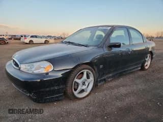 ✅ 1998 Ford Contour • VIN: 1FAFP68G5WK266577 • Лот: 92437505. Опубликован ранее на Copart с пробегом 152 227 миль. Бесплатный доступ к архиву аукционных продаж из США и подробный отчёт об истории автомобиля на DreamBid. Изображение 1.