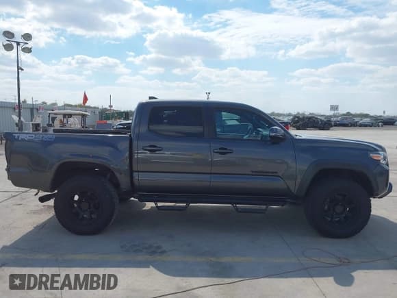 ✅ 2019 Toyota Tacoma SR5 • VIN: 3TMCZ5AN9KM219386 • Лот: 43462886. Опубликован ранее на IAAI с пробегом 102 938 миль. Бесплатный доступ к архиву аукционных продаж из США и подробный отчёт об истории автомобиля на DreamBid. Изображение 14.