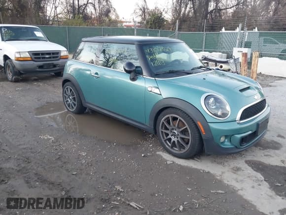 ✅ 2012 MINI Hardtop S • VIN: WMWSV3C5XCT385392 • Lot: 43852029. Listed on IAAI with 150,969 mi. Free auction sales archive from the USA and detailed vehicle history report at DreamBid. Image 1.