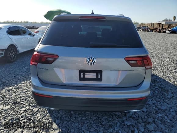 ✅ 2021 Volkswagen Tiguan S • VIN: 3VV1B7AX3MM107874 • Лот: 82626275. Опубликован ранее на Copart с пробегом 40 322 миль. Бесплатный доступ к архиву аукционных продаж из США и подробный отчёт об истории автомобиля на DreamBid. Изображение 6.